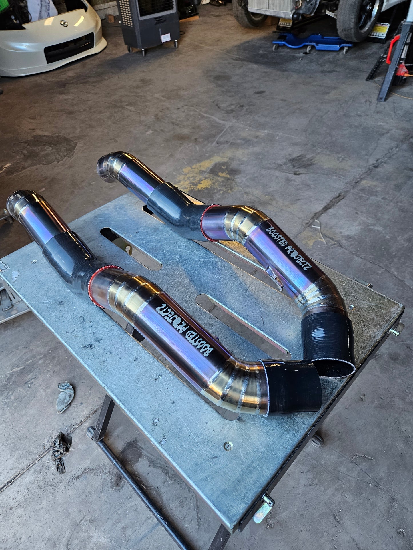 Titanium charge pipes